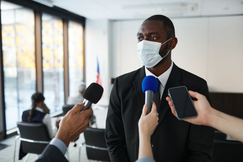 grieving family member speaking press conference microphone