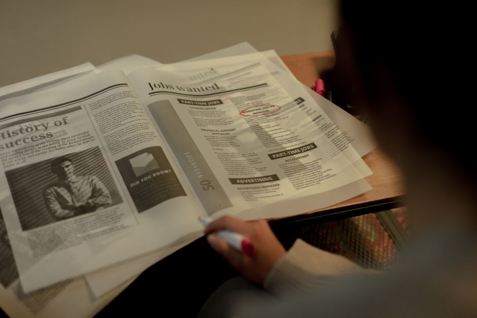 scientist reading classified documents dim office